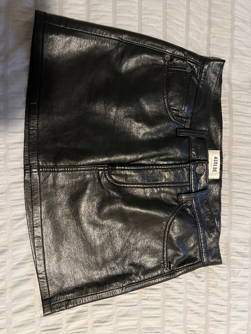 Mini black faux leather skirt